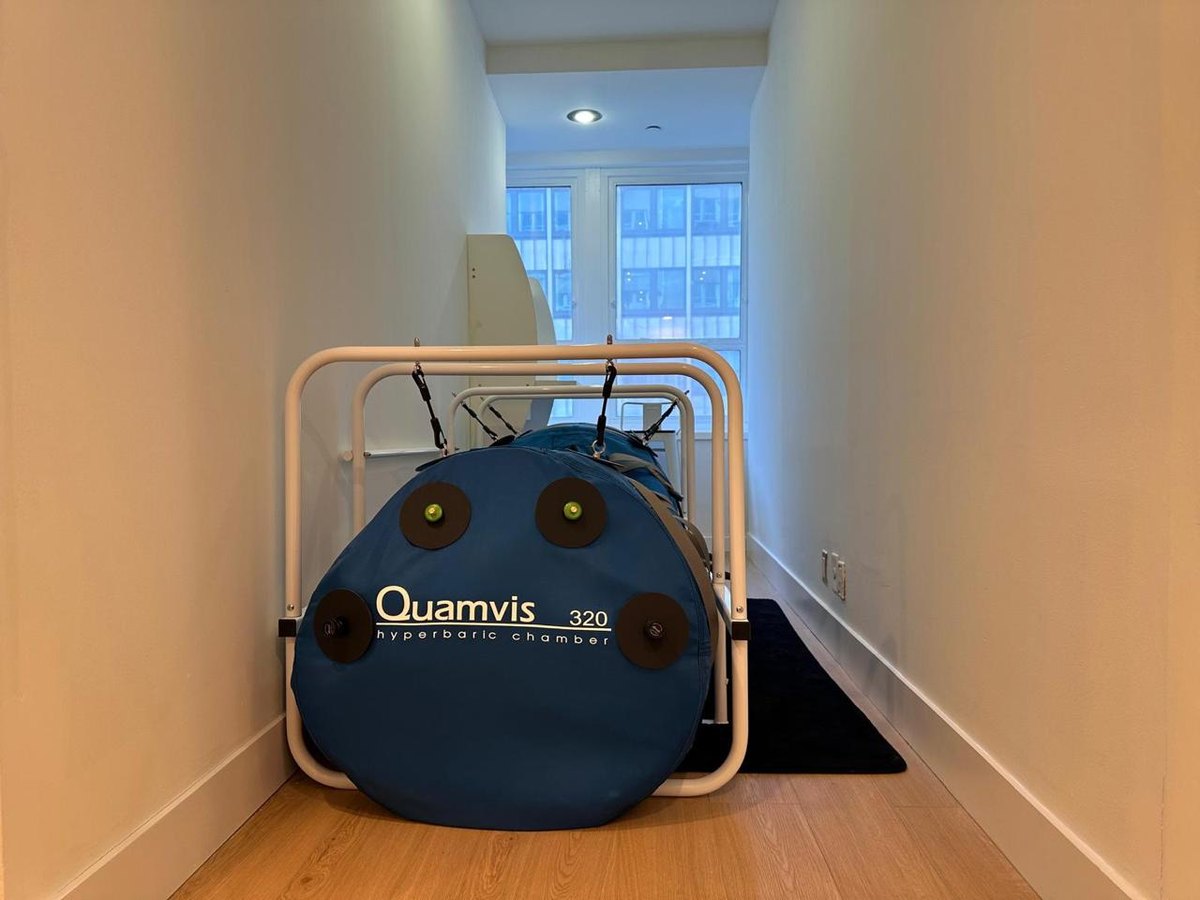 Soft-shell hyperbaric chamber by a window