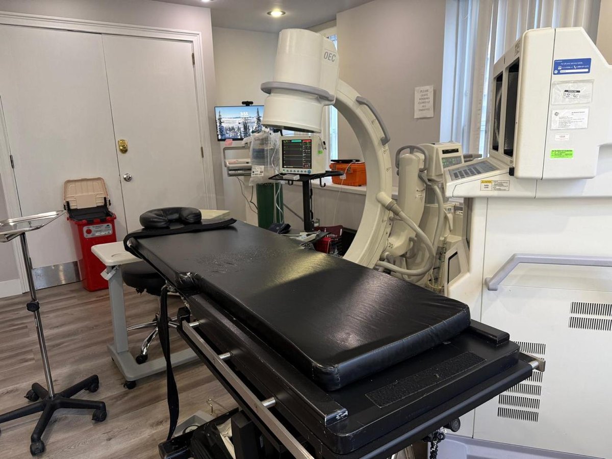 Procedure room with C-arm fluoroscopy