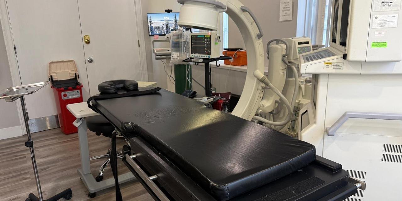 Procedure room with C-arm fluoroscopy